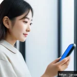소비자 보호 관련 최신 동향과 사례 연구 - A modern Japanese online shopping scene featuring a young woman comfortably using her smartphone at ...